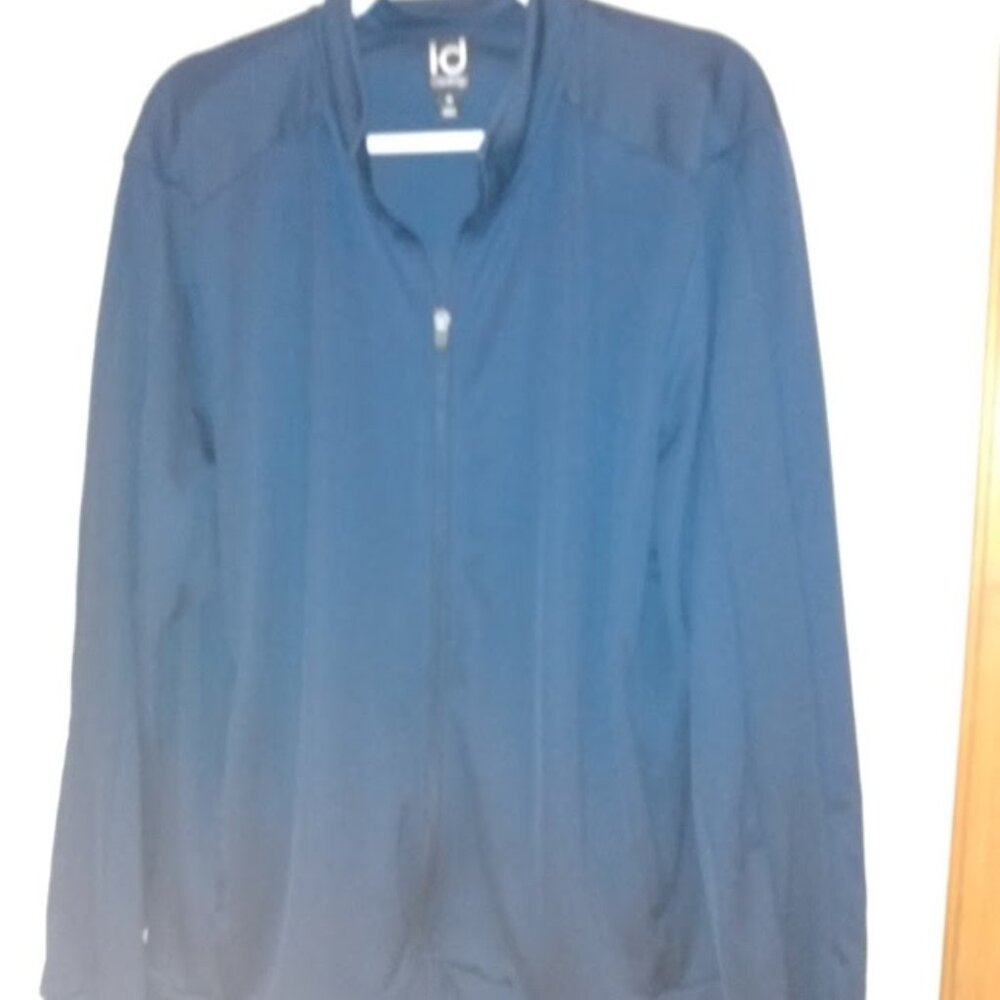 Ideology: Navy blue long sleeve zip closure jacket. 100% Polyester. Size X-Large